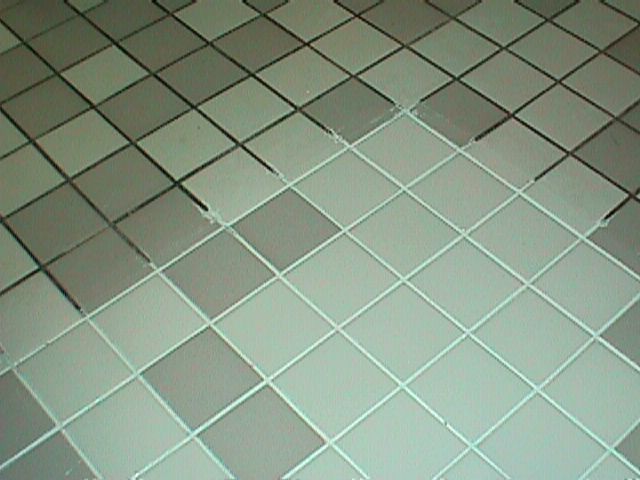 How do you remove grout?